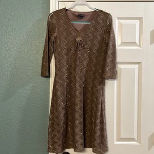 Ready for a good home! Brown & cream colored dress.